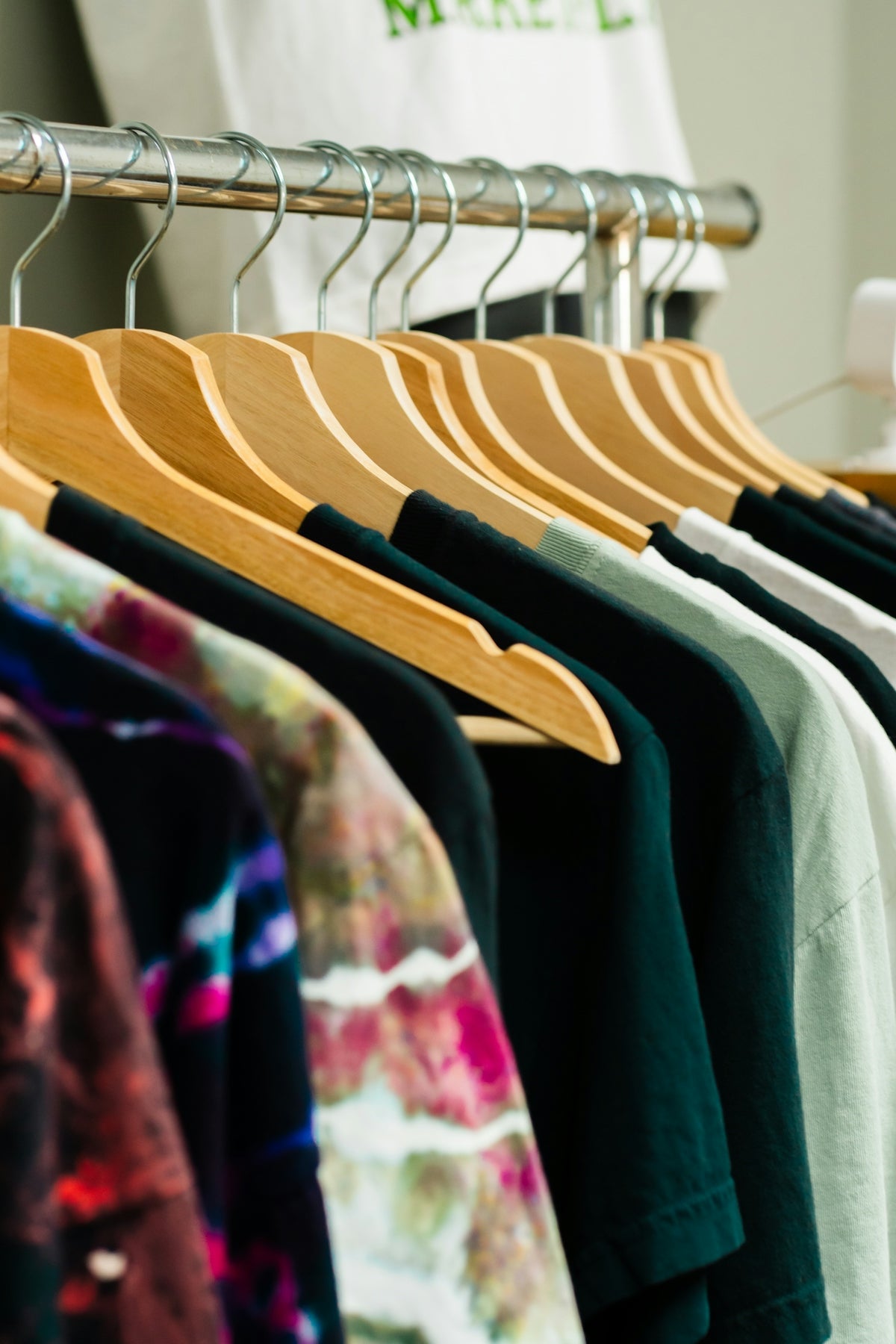 T-shirts on hangers in a retail display