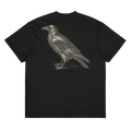 A black short-sleeve t-shirt with a detailed gray graphic of a raven on the back.