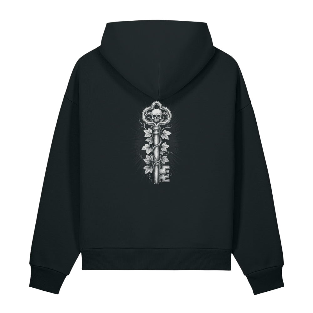 Back of a black heavyweight hoodie with a bone ornate key and ivy print
