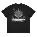 Back of a black heavyweight box tee with a large compass star and cracked landscape print